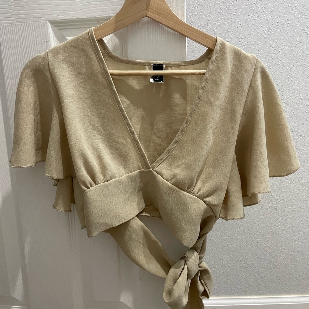 tan cropped blouse